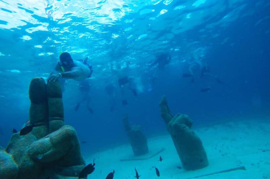PDC: Isla Mujeres Catamaran Tour with Snorkeling - Downtown Isla Mujeres: 1.5 hours for culture and shopping