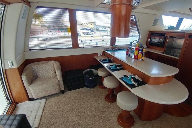 Playa Mujeres rent a Yacht 4hrs with Food and drinks aboard CA55 - Playa Norte Beach Break: Your Time to Swim and Recharge