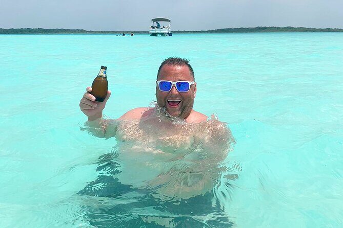 Pontoon Tour of the Bacalar Lagoon - Cenote Esmeralda: emerald color and the first hotel clue