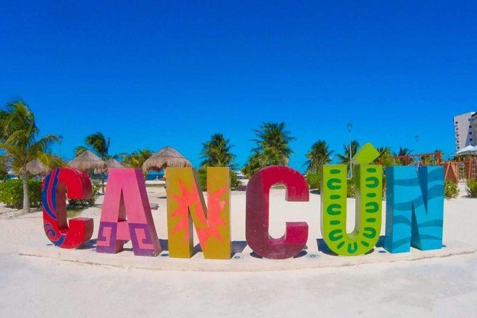 Private Cancun Shopping and City Tour - Playa Delfines, El Mirador, and the Cancun sign photo moment