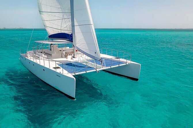 Private Catamaran from Cancun to Isla Mujeres | For up to 100 pp - On board vibe: drinks included and crew energy matters
