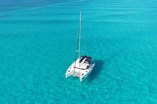 Private Catamaran Tour Super to Isla Mujeres - Getting to the water: meeting at Playa Tortugas and timing your day