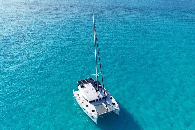 Private Catamaran Tour Super to Isla Mujeres - Sunset on the catamaran: why the extra onboard time matters