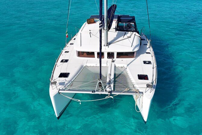 Private Catamaran Tour Super to Isla Mujeres - Private crew service: Captains, guides, and photographers who get praised
