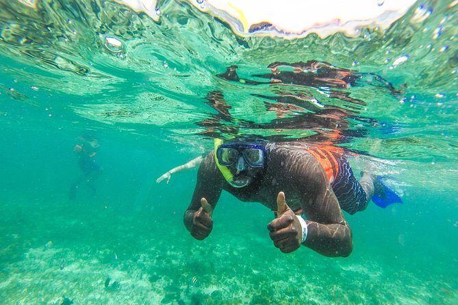 Private Catamaran Tour to Isla Mujeres with Snorkeling from Cancun - Stop 4: Downtown Isla Mujeres and Calle Hidalgo for Food and Souvenirs