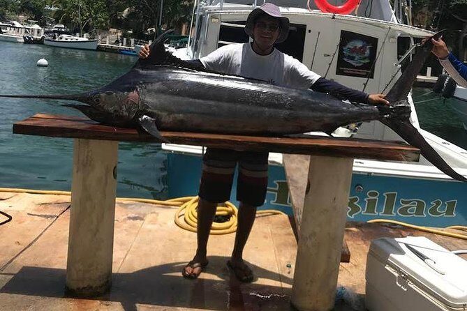 Private Fishing Tour in Yacht Playa del Carmen - Stop 1 at Puerto Aventuras Marina: Your 8:00 am Start