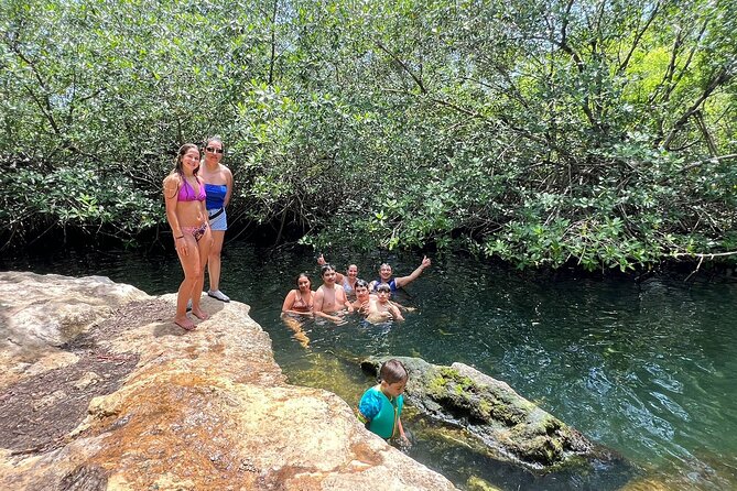 Private Jeep Cenotes Expedition in Cozumel - Stop 2: Jade Cenote’s green water and a calmer rhythm