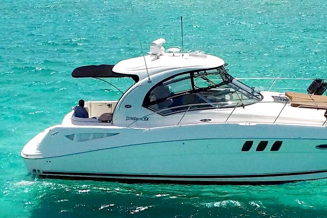 Private Tour of Cancun to Isla Mujeres by 45-foot Yacht. - Cruising the Nichupte Lagoon: Views With a Drink in Hand