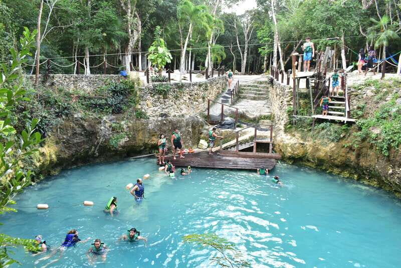 Rider Tour - The open cenote finish: swimming, jumps, and zipline time over water