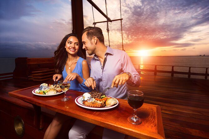 Romantic Sunset Dinner Cruise in Cancun with Open Bar - Live sax, onboard atmosphere, and that romantic music pacing