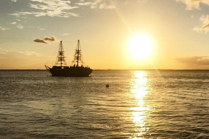 Romantic Sunset Dinner Cruise in Cancun with Open Bar - Getting to the marina: timing, location, and what to bring