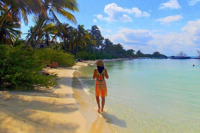 Sailing at Isla Contoy & Isla Mujeres! Snorkel at Ixlache Reef - Isla Mujeres: the 1-hour stop for souvenirs, photos, and quick attractions