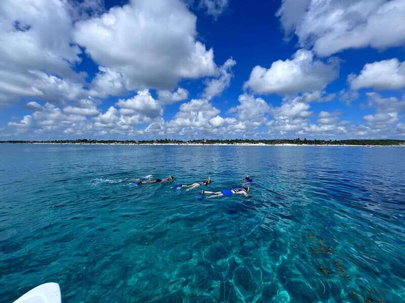 SNORKEL IN TULUM REEF, BOAT RIDE AND CALETA - Secret seashore stop: caleta swimming, photos, and that cenote-style water