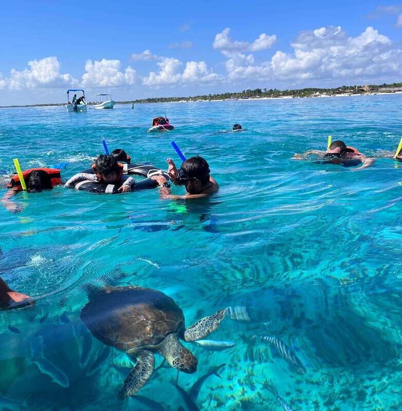 SNORKEL IN TULUM REEF, BOAT RIDE AND CALETA - Tulum views from the sea: ruins, panoramic boat ride, and sea-only temples