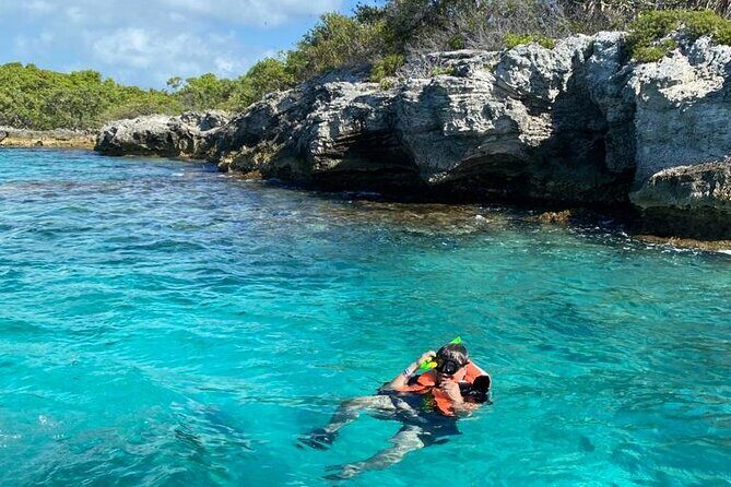 Snorkeling in Isla Mujeres and Underwater Museum - Beach Club and Lunch Break: Tikinxic Roast Fish on Shore