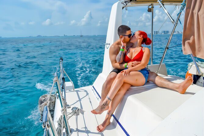 Splendid Isla Mujeres Catamaran: drinks and fun all day! - El Meco Reef snorkeling: gear included, with safety built into the plan