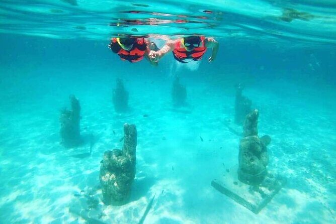 Splendid Isla Mujeres Catamaran: drinks and fun all day! - Explore Isla Mujeres on your own for 1.5 hours