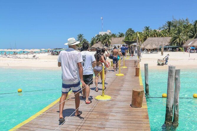Splendid Isla Mujeres Catamaran: drinks and fun all day! - Back to Cancun at golden hour: music, dancing, and sea views