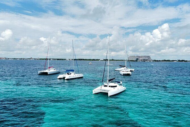 Splendid Isla Mujeres Catamaran: drinks and fun all day! - Sail-away from Cancun: check-in energy and the open-water vibe