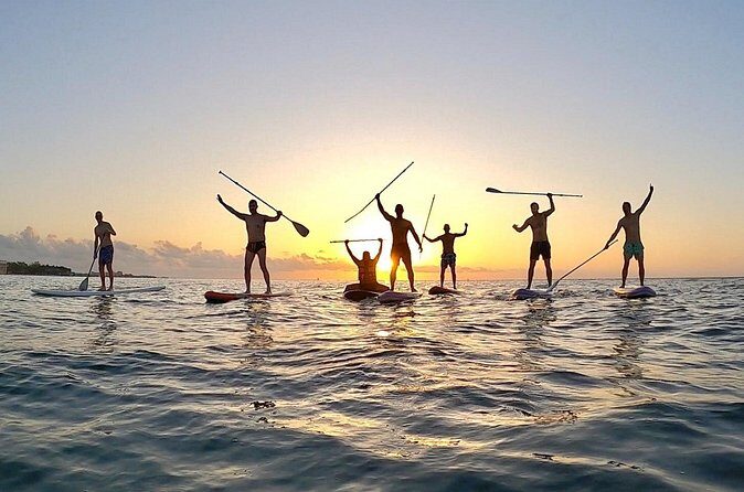 Sunrise Paddle Surf - On the water: calm beach start, shared group energy, and sunrise views