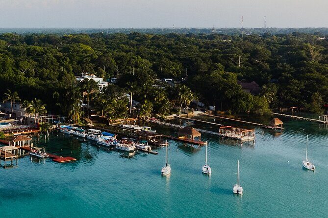 Sunset Sailing Tour in Bacalar with Outdoor Bar and Lunch - Stop 2: Cenote Esmeralda and the color contrast you’ll remember