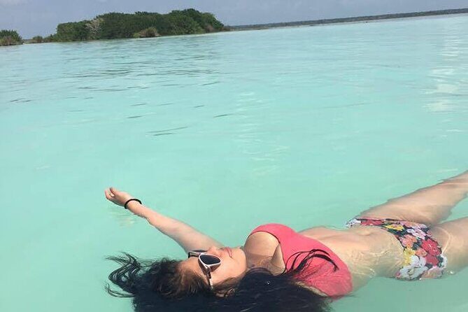 The 7 Colors Of Beauty Lagoon, Bacalar Experience from Tulum City - Xul-Ha Lagoon: the blue comes from depth and cenote connections
