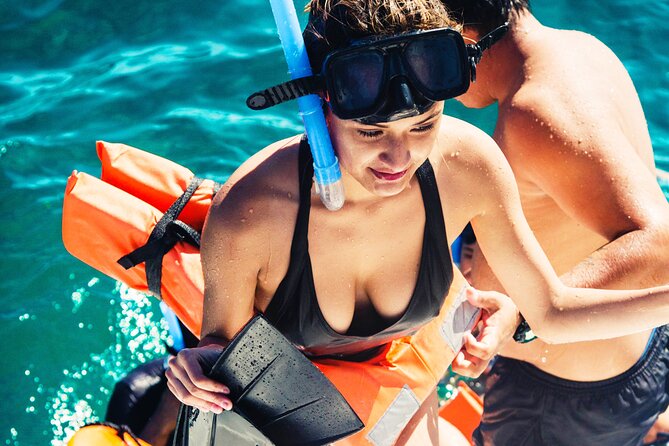 The Best Catamaran tour to Isla Mujeres with Open Bar and Lunch - Price and Logistics: The Real Cost Check (Mandatory Fee Included)