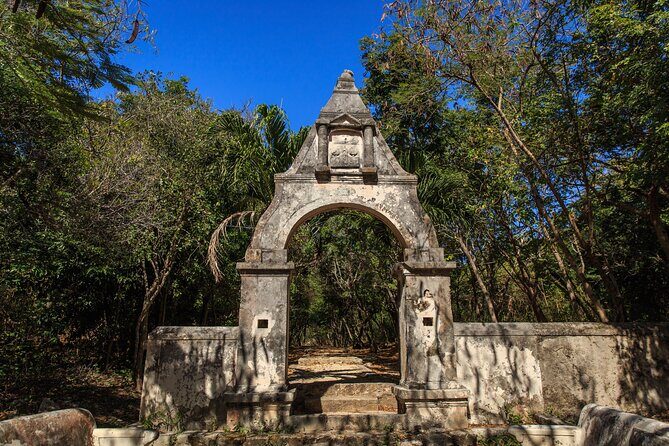 The Best of Isla Mujeres Private Walking Tour - Stop 1: Capilla de Guadalupe with ocean views and a crucifix backdrop