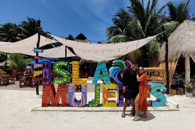 Top Isla Mujeres Catamaran Tour with Snorkel Open Bar and Buffet lunch - Open bar on the return to the reef: fun factor and practical reality