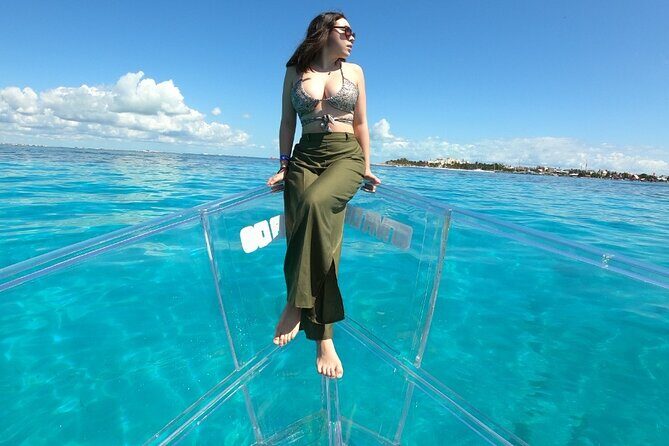 Tour Isla Mujeres excursion in Collective Transparent Boat - What to Bring: Sunscreen, No Shoes on Board, and Photo Expectations