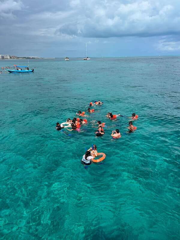 Tour Isla Mujeres: From Cancún-Riviera Maya all Included - Snorkeling at Isla Mujeres: Full Gear, Underwater Statues, and Coral Fish