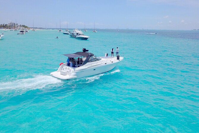 Tour to Isla Mujeres on Premium Yachts from Cancun - Stop 1 in Cancun Bay: El Meco Reef Snorkel and a Shipwreck Option