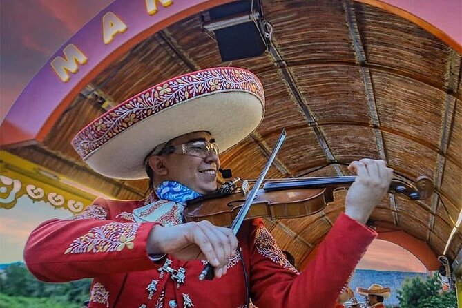 Tour Xoximilco From Cancun with Transportation Included - The Trajinera Canal Ride: Music, Dancing, and a Big Social Atmosphere
