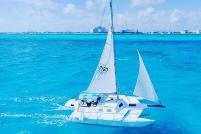 Trip to Isla Mujeres by Catamaran, with snorkeling and drinks - Getting picked up in Cancún and nearby areas