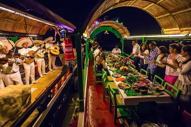 Xoximilco Night Cruise With Round Transportation from Tulum City - The Big Idea: A Mexican Night Party on a Colorful Tr a j i n e r a