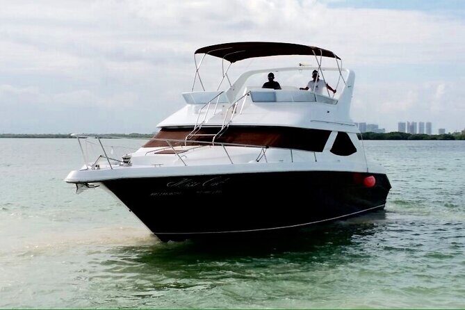 Yacht 48ft Rental in Cancun for up to 15 people - Snorkeling gear, swim-platform time, and real safety help