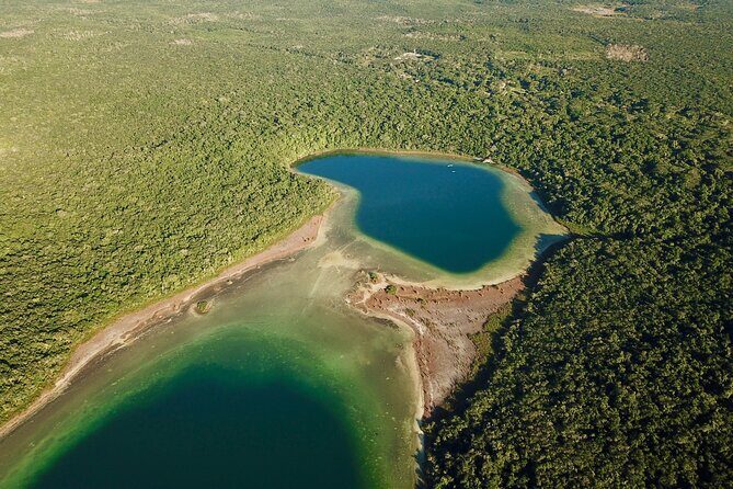 Zip lining and Canoe Monkey jungle in Tulum - Punta Laguna Nature Reserve: monkeys, birds, and lagoon jungle time
